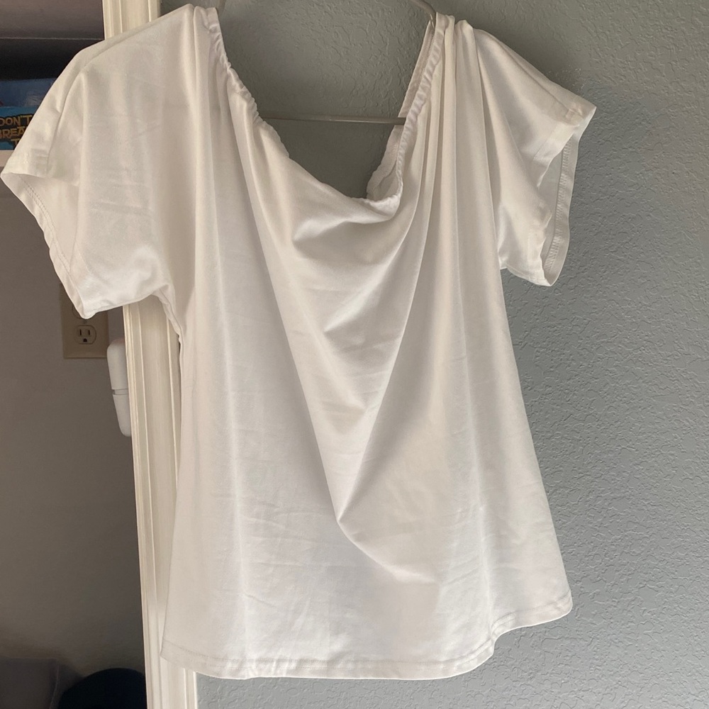 2 shirts one White Women's off the shoulder Short Sleeve Top and one black